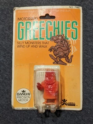 Monstruo Silly BANDAI AMERICA Motorizado GREECHIES (Rojo) ENROLLA y Camina NO 7980 Foto 1 de 4
