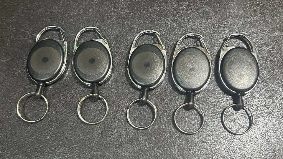 5 Llavero retráctil de alta resistencia con soporte para tarjeta de identificación Foto 1 de 3