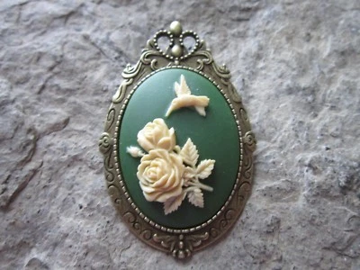 2 EN 1 - BROCHE/COLGANTE CAMAFEO COLIBRÍ Y ROSAS BRONCE - VERDE  Foto 1 de 2