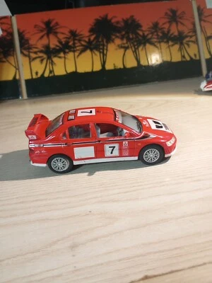 Puertas de apertura de China fundidas a presión Kinsmart Mitsubishi Lancer Evolution VII 1:36 RR... Foto 1 de 4