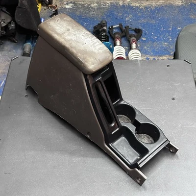 Toyota 4Runner 1996-2002 consola central reposabrazos portavasos OEM roble marrón Foto 1 de 4