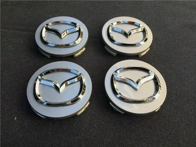 JUEGO DE 4 TAPACUBOS MAZDA Silver CENTER EMBLEMA CROMADO 56MM LOGO TAPACUBOS Foto 1 de 2