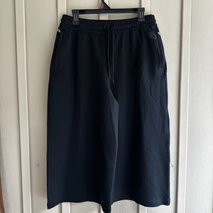 Pantaloni NikeLab Essentials Culottes Medium 889881-010 gamba dritta ritagliati laboratorio - Foto 1 di 12