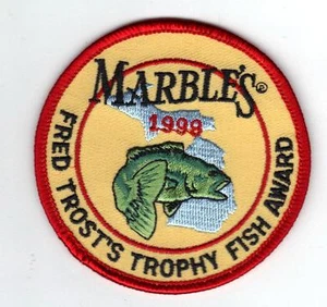 1999 FRED TROST FISHING PATCH-MICHIGAN DEER-BEAR-TURKEY-ELK-MOOSE-FISH-ONTARIO - Picture 1 of 1