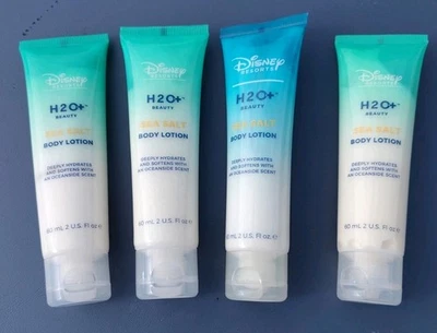 Lote de 4 • Disney Resorts H2O+ Beauty • Loción corporal de sal marina • 60 ml (2 fl oz) Ea Foto 1 de 4