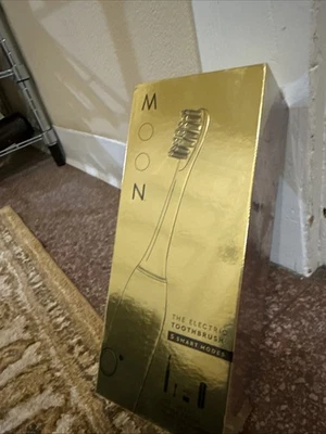 Cepillo de dientes eléctrico New Moon Bucal Care USB recargado DORADO impermeable cabezal sónico Foto 1 de 4