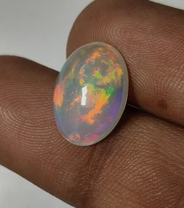 Welo Ethiopian Opal Oval Shape Cabochon Multi Flashy Fire Loose Gemstone10.5x14M - Picture 1 of 22