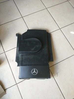 Cubierta genuina 97 Mercedes-Benz E420 OEM 119-090-04-12 rota 1 pestaña en el extremo derecho Foto 1 de 4