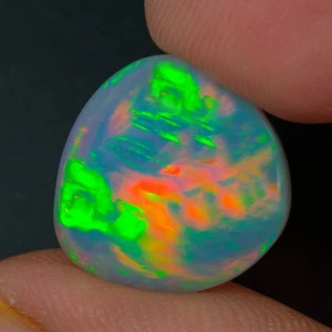 8.20 CT TOP-NOTCH FIRE 360* FLASHY MULTI COLOR PLAYED ETHIOPIAN WHITE FIRE OPAL - Picture 1 of 6