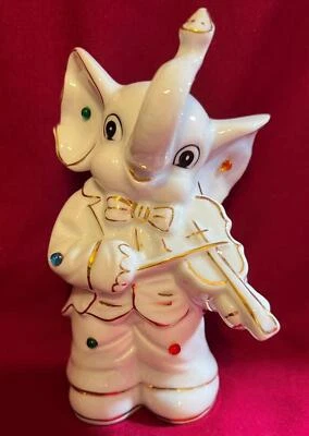 Vintage Porcelain Jeweled Elephant Playing the Violin Fiddle Coin Bank - Image 1 of 3