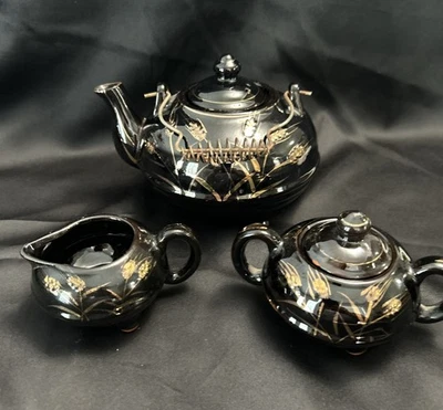 Tetera vintage negra roja con patrón de trigo dorado, crema y azúcar Japón Foto 1 de 4