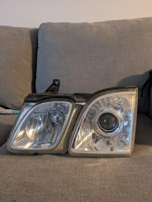 LÂMPADA DE FAROL LEXUS LX470 DRIVER ESQUERDO - Imagem 1 de 4