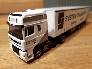 AWM Sattelzug DAF SYSTEM TRANSPORT HERNING DANMARK  NEU IM KARTON 😊!!! - Bild 1 von 7