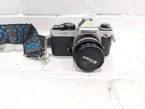 Nikon FE2 35MM Film Camera Silver Body 50mm Lens Vintage Strap Untested - Picture 1 of 13
