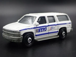 2000-2006 CHEVY CHEVROLET SUBURBAN NYPD W HITCH 1:76 SCALE DIECAST MODEL CAR - Picture 1 of 7