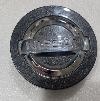 2012-2022 Nissan Armada, Titan OEM Dark Charcoal Center Cap 62595 40342-5ZM1A - Image 1 of 4