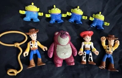 8 figuras Fisher Price Imaginext Disney Toy Story - Woody Jesse Aliens Lotso Foto 1 de 4