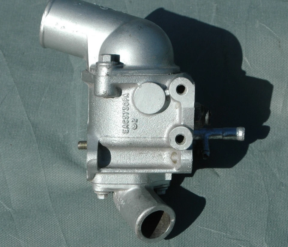 1988-1992 Jaguar XJ6 Thermostat Housing & Coolant Distributor  EAC8209 EAC5730PA - Image 1 of 4