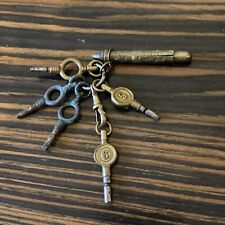 5 Various Antique Pocket Watch Winding Keys And A Tool