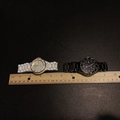 Daniel Steiger Cerámica Movimiento Suizo Reloj Lote Hombre Mujer Lote de 2 Relojes Foto 1 de 4