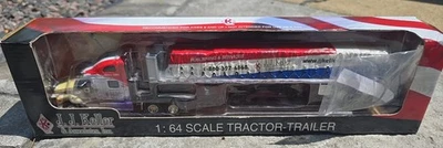 DCP JJ Keller Peterbilt 387 with Wilson RoadBrute Trailer Covered Load 1/64  - Image 1 of 4