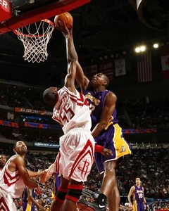 Dikembe Mutombo Blocks Andrew Bynum Houston Rockets 8x10 NBA Basketball Photo - Picture 1 of 1