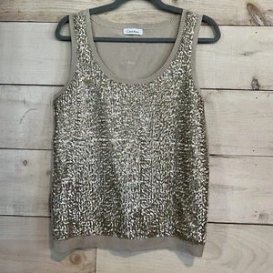 Chaleco de punto y lentejuelas doradas de Calvin Klein - Imagen 1 de 4