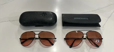 Dos pares de gafas de sol vintage Drivers Corning Optics con estuches. Foto 1 de 4