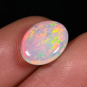 Natural Ethiopian Multi Fire opal Oval Cabochon Loose Gemstone 9x7MM - Picture 1 of 11