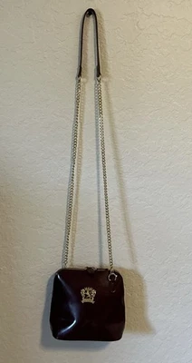 Bolso de mano bandolera Pratesi Firenze charol azul marino borgoña con herrajes dorados Foto 1 de 4