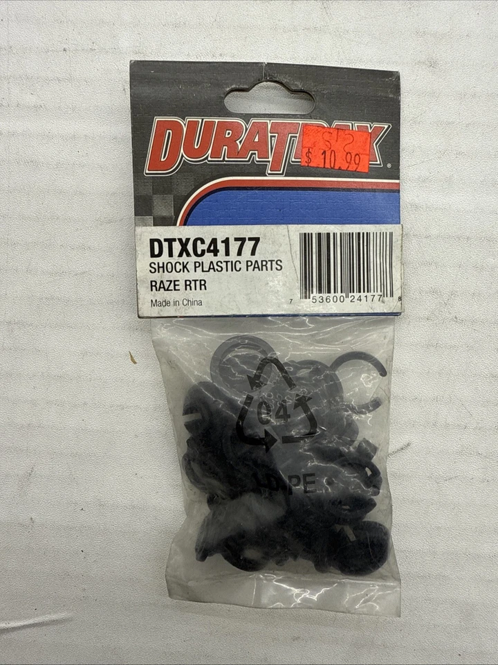 Duratrax  DTXC4177 SHOCK PLASTIC PARTS RAZE RTR F14 - Image 1 of 1