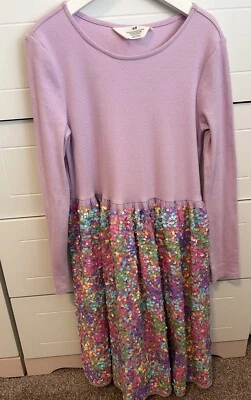 Vestido púrpura con nalgas de H&M para niñas  Foto 1 de 4