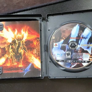 Devil May Cry 4 PS3, CIB, inkl. Handbuch, GameStop Case, leichte Disc Kratzer - Bild 1 von 12