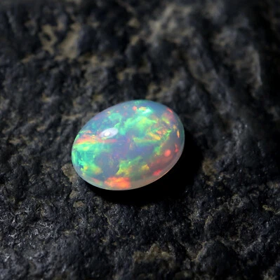 2.3 Cts 11.5x8.7 MM Real AAA Green Red Yellow Fire Ethiopian Opal Oval Cabochon - Image 1 of 4