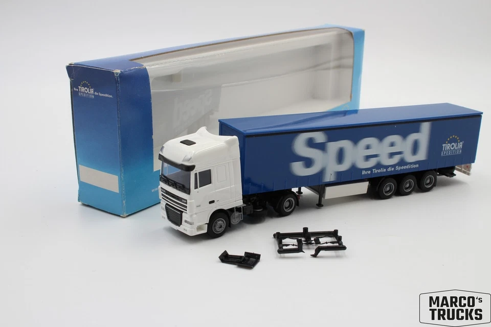 AWM DAF XF105 curtain-side semi-trailer "Tirolia Spedition Speed" 1:87 /AW2867 - Image 1 of 1
