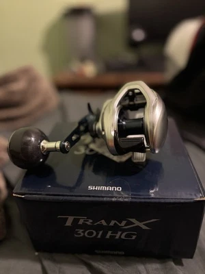 Shimano 2024 Tranx 301 HG A 7.6:1 Left Hand Casting Fishing Reel - Image 1 of 4