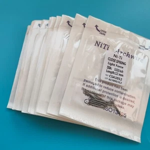 200 piezas de aleación de resorte helicoidal NiTi de cierre dental de ortodoncia 0,010 * 12 mm fuerza de luz - Imagen 1 de 6
