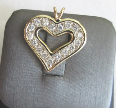 Colgante corazón diamante oro 14K diamante = 1,25 quilates F-SI2 4,10 gramos Foto 1 de 4