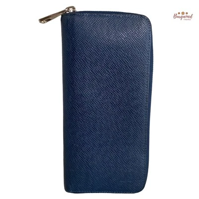 Authentic Louis Vuitton Blue Marine Navy Taiga Leather Vertical Zippy Wallet - Image 1 of 4