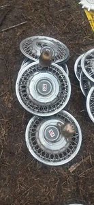 OLDSMOBILE SPOKE HUBCAPS 14" - Picture 1 of 11