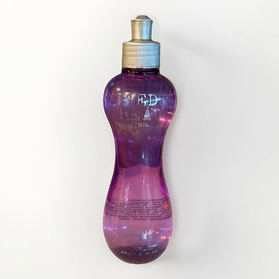 LOCIÓN SECADORA TIGI BED HEAD SUPERSTAR 8,45 OZ botella rayada completa Foto 1 de 2