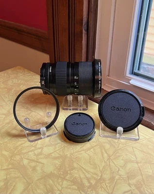 Lente zoom Canon FD 35-105 mm f3,5 macro con tapas de lente Canon + filtro Tiffen MF Foto 1 de 4