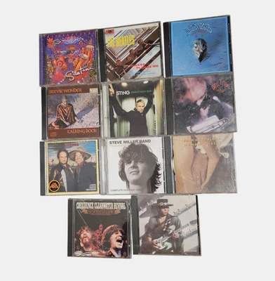 Лот из 11 компакт-дисков рок поп-блюз соул - Santana, The Beatles, Eagles, Stevie Wonder - Изображение 1 из 4