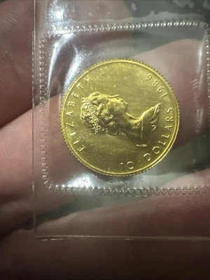 Moneda de oro puro 999 hoja de arce Canadá 1987 Isabel II de 10 dólares 1/4 onza Foto 1 de 2