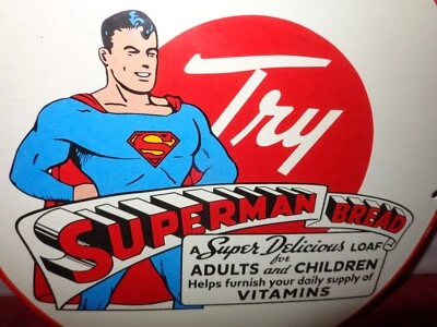 VINTAGE 1941 SUPERMAN BREAD 11 3/4" PORCELAIN METAL COMIC BOOK GASOLINE OIL SIGN - Image 1 of 4