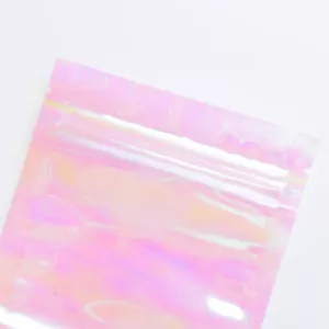 100 bolsas planas de belleza holográficas rosas transparentes embalaje termosellables - Imagen 1 de 8