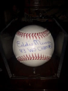 Eddie Murray Autographed Baseball In Protective Case. With Inscription - Picture 1 of 1