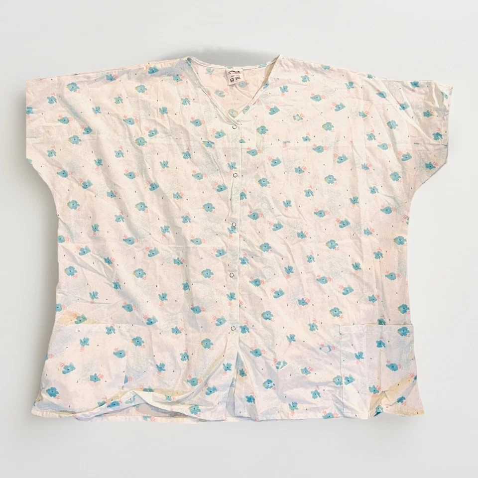 Women’s A1 APPAREL 46587-525X Flowered Blue Scrub Top Plus Size 5XL - Image 1 of 4