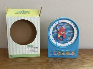 Joyero musical Dancing Elmo 2004 215-11 nuevo todavía en caja - Imagen 1 de 7