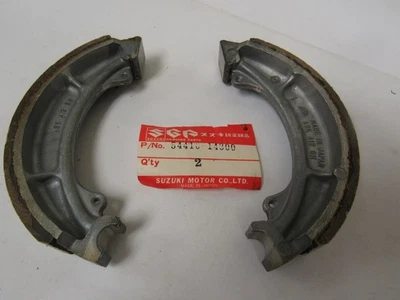 Juego de zapatas de freno todo terreno nuevo OEM Suzuki 1983-1984 RM125 RM250 RM500 54410-14300 Foto 1 de 2